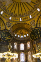 Turkey, Istanbul, Sultanahmet, Haghia Sophia Christian murals and Muslim iconography in calligraphic roundels together in the domed interior.