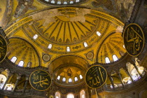 Turkey, Istanbul, Sultanahmet, Haghia Sophia Christian murals and Muslim iconography in calligraphic roundels together in the domed interior.