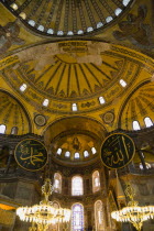 Turkey, Istanbul, Sultanahmet, Haghia Sophia Christian murals and Muslim iconography in calligraphic roundels together in the domed interior.