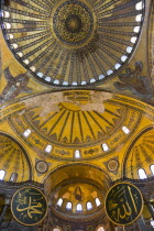 Turkey, Istanbul, Sultanahmet, Haghia Sophia Christian murals and Muslim iconography in calligraphic roundels together in the domed interior.