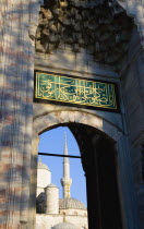 Turkey, Istanbul, Sultanahmet Camii, The Blue Mosque Courtyard and minaret seen through the exit to the Hippodrome.