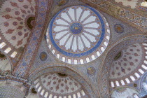 Turkey, Istanbul, Sultanahmet Camii, The Blue Mosque interior with decorated painted domes.