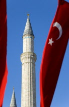 Turkey, Istanbul, Sultanahmet, Haghia Sophia minaret and Turkish red flag with white crescent moon and star.