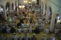 Sri Lanka, Negombo, men at prayer inside mosque.