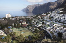 Spain, Canary Islands, Tenerife, Los Gigantes, View over hillside town and cliffs.