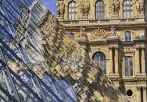 France, Ile de France, Paris, Louvre Museum and glass pyramid.