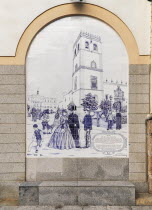 Spain, Extremadura, Badajoz, tiled arches on building in Paseo de San Franciscoshowing the Cathedral and Ayuntamiento.