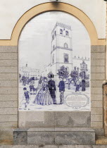 Spain, Extremadura, Badajoz, tiled arches on building in Paseo de San Franciscoshowing the Cathedral and Ayuntamiento.