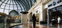 United Arab Emirates, Dubai, Arab Emirati woman in black at Dubai MALL.