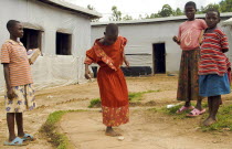 Burundi, Cibitoke Province, Mabayi Primary School, Girls playing hopscotch beside the Catch-up Class for children who have dropped out of school. Concern Worldwide has supported the establishment of a...