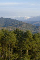 Nepal, Nagarkot, View across clouded Kathmandu valley towards Himalayan mountains