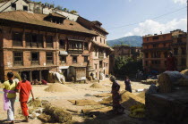 Nepal, Bhaktapur, Grain drying in sun.