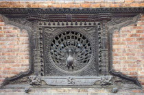 Nepal, Bhaktapur, The famous Peacock Window in streets of the old quarter.