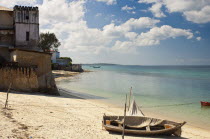 Tanzania, Zanzibar, Stone Town, Looking along the golden sands of the beach.