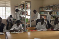 Uganda, Kabarole District, Student teachers in the library at Fort Portal Teacher Training College.
