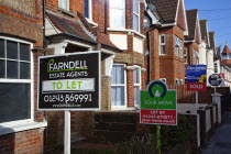 England, West Sussex, Bognor Regis, To Let signs outside houses and flats.