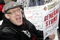 England, London, Sam Brackenbury from Birmingham at a demonstration outside Parliament on budget day 2013 protesting abouit Government cuts and calling for a general strike.  photo by Sean Aid...