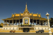 Cambodia, Phnom Penh, Queen Mother portrait at entrance to Royal palace.