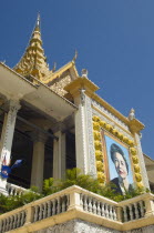 Cambodia, Phnom Penh, Queen Mother portrait at entrance to Royal palace.