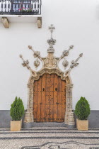 Spain, Extremadura, Olivenza, Ayuntamiento Town Hall doorway detail.