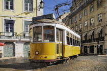 Portugal, Estremadura, Lisbon, Praco do Fiqueira, yellow tram number 28 entering the square.