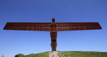 England, Tyne and Wear, Gateshead, Angel Of The North, Steel Sculpture Standing 20 Metres Tall, With Wingspan Of 54 Metres, Constructed From Steel,  Designed By Antony Gormley, Against A Deep Blue Sky...
