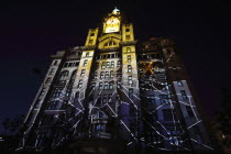 England, Merseyside, Liverpool, Royal Liver Building 100th anniversary, constructed in 1911, celebrated by staging a 3D Macula light show with the theme Spider on Spider's Web.