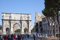 Italy, Lazio, Rome, The Arch of Constantine with the Coliseum behind.