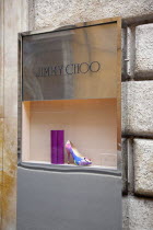 Italy, Lazio, Rome, Via del Condotti, Jimmy Choos display window with shoe and handbag,