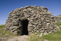 Ireland, County Kerry, Dingle Peninsula, Beehive hut in the Fahan Group.