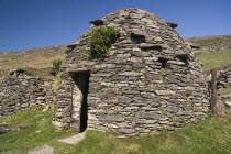 Ireland, County Kerry, Dingle Peninsula, Beehive hut in the Fahan Group.