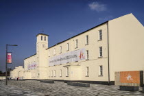 Ireland, Derry, Former Ebrington Barracks building with Derry 2013 Year of Culture banner.