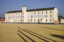 Ireland, Derry, Former Ebrington Barracks building with Derry 2013 Year of Culture banner.