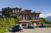 Bhutan, Zhemgang Dzong with Police parked at entrance..