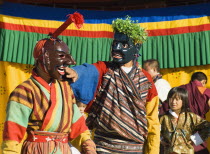 Bhutan, Thimpu Dzong, Two Atsaras, or comedians at a masked dance Tsecchu.