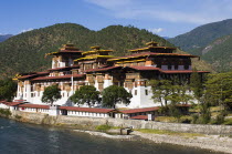 Bhutan, Punakha Dzong beside river.
