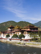 Bhutan, Punakha Dzong beside river.