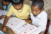 Bangladesh, Bandarban, Primary school classroom demonstrating child-centred group based work initiated by an NGO.
