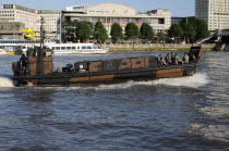 England, London, Royal Marines on board an Landing Craft Mk5 patrolling the River Thames during the 2012 Olympics.