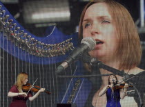 Music, Strings, Violin, fiddle players from the Shee band playing at Cropredy 2011.