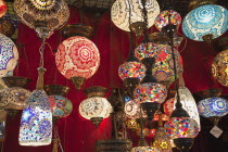 Turkey, Istanbul, Fatih, Sultanahmet, Kapalicarsi, Display of ornate coloured glass lamps in the Grand Bazaar.