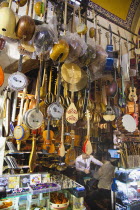 Turkey, Istanbul, Fatih, Sultanahmet, Kapalicarsi, Music stall displaying various musical instruments in the Grand Bazaar.