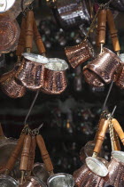 Turkey, Istanbul, Fatih, Eminou, Misir Carsisi, Copper pots for sale outside the Spice Market.