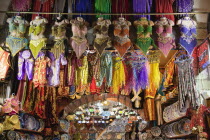 Turkey, Istanbul, Fatih, Eminou, Misir Carsisi, Display of traditional clothes in the Spice market.