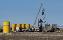 Canada, Alberta, Granum, Argosy Energy Inc fracking for tight shale oil in a wheat field at the edge of the Baaken play.