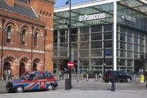 England, London, Taxi cabs outside the entrance to St Pancras Railway Station.