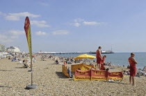 England, East Sussex, Brighton, Lifeguards on the beach.