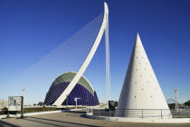 Spain, Valencia Province, Valencia, La Ciudad de las Artes y las Ciencias, City of Arts and Sciences,El Pont de l'Assut de l'Or Bridge and Agora with lift from Umbracle car park in foreground.