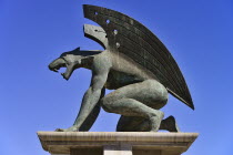 Spain, Valencia Province, Valencia, Puente del Reino, A gargoyle at the entrance to the bridge, Puente del Reino is one of many bridges over the former Rio Turia which now serves as a park as the rive...