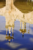 Spain, Valencia Province, Valencia, Puente del Mar reflected in a pool on the riverbed of the former Rio Turia which is now a park as the river has been diverted due to constant flooding of the city.